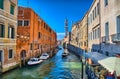 Scenic narrow canal with Carabinieri boats, Venice, Italy, HDR Royalty Free Stock Photo