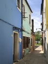 Scenic narrow colorful houses at the venetian island of Burano, Venice, Italy