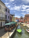 Scenic narrow colorful houses at the venetian island of Burano, Venice, Italy