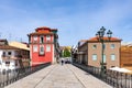 scenic narrow street in Chaves in early morning light with cobble stones and old historic houses