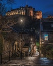 Scenic night view of Edinburgh Castle from Vennel Steps in the Grassmarket area, Scotland. Royalty Free Stock Photo