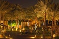 Scenic night view of hotel area with palm trees and illuminations. Sharm El Sheik, Egypt. Summer vacation concept Royalty Free Stock Photo