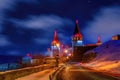 Scenic nightscape of illuminated medieval fortress of Kamianets-Podilskyi, Ukraine Royalty Free Stock Photo