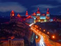 Scenic nightscape of illuminated medieval fortress of Kamianets-Podilskyi, Ukraine Royalty Free Stock Photo