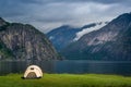 Scenic Norway fjord landscape with touristic tent close to the water. Eidfjord. Royalty Free Stock Photo