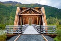 Scenic old wooden bridge in fall Northern nature