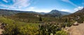 Scenic panorama of a bright vegetated dry landscape between mountains in spain