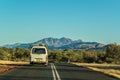 Scenic panorama of a car driving on the namatjira drive to MacDonnell National Park in NT central outback Australia