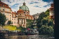 Scenic panorama cityscape view of Moldava river boat Prague in Czech Republic.