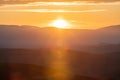 Scenic panorama of the Tuscan landscape with hills and harvest fields in golden morning light, Val d'Orcia, Italy. Royalty Free Stock Photo