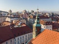 Scenic panoramic aerial drone view of rooftops of medieval city center, town hall and cathedral church in Ljubljana