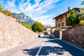 Scenic panoramic beltway road around lake Garda with medieval architecture, small cities and villages, high mountains and rich
