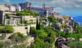 Scenic panoramic view on medieval picturesque old french village on hill top, blue summer sky, fluffy clouds - Gordes, Provence, Royalty Free Stock Photo