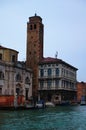 Scenic panoramic view over Grand Canal in Venice. Moored boats near colorful ancient buildings Royalty Free Stock Photo