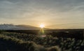 Scenic panoramic view of the sun rising over the Mauna Kea mountain on the Big Island of Hawaii Royalty Free Stock Photo