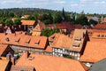 Scenic panoramic view traditional shingle tiled red rooftop old ancient medieval european german small town Quedlinburg