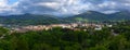 Scenic panoramic view of a village in mountain valley at sunset. Colourful countryside landscape with mountain