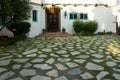 Scenic pathway of stones winding up to the Adamson House on a sunny day, Malibu