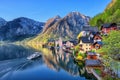 Scenic picture-postcard view of famous Hallstatt mountain village in the Austrian Alps at beautiful light in spring, Salzkammergut Royalty Free Stock Photo