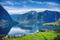 Scenic picture-postcard view of famous Hallstatt mountain village in the Austrian Alps at beautiful light in spring, Salzkammergut Royalty Free Stock Photo