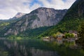 Scenic picture-postcard view of traditional old wooden houses in famous Hallstatt mountain village at Hallstattersee lake Royalty Free Stock Photo