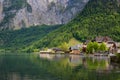 Scenic picture-postcard view of traditional old wooden houses in famous Hallstatt mountain village at Hallstattersee lake Royalty Free Stock Photo