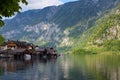 Scenic picture-postcard view of traditional old wooden houses in famous Hallstatt mountain village at Hallstattersee lake Royalty Free Stock Photo