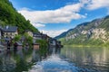 Scenic picture-postcard view of traditional old wooden houses in famous Hallstatt mountain village at Hallstattersee lake Royalty Free Stock Photo