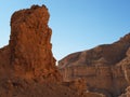 Scenic pillar rock in a stone desert at sunset Royalty Free Stock Photo