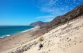 Scenic Point Mugu and Thornhill Broome Beach seen from Sandy Dune vista under beautiful sunny cumulus cloudscape in Southern