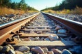 Scenic railroad track in sunlight, ballast gravel, and crushed stone