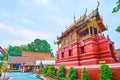 The red Ho Trai of Wat Phra That Hariphunchai Temple, Lamphun, Thailand