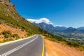 Scenic road at Franschhoek valley with its famous wineries and surrounding mountains Royalty Free Stock Photo