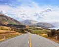 Scenic road near Lake Hawea in the sunny autumn day, South island, New Zealand Royalty Free Stock Photo