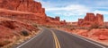 Scenic road in the red rock canyons. Arches National Park, Moab, Royalty Free Stock Photo