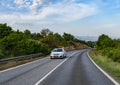 Scenic road. Road is surrounded by a magnificent natural landscape.