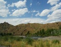 Roadside view of Wyoming landscape with the Soshone River along the North Fork Highway