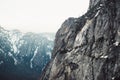 Scenic rock mountain top with fog at winter time in Yosemite National Park