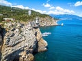 Scenic rocky coastline with castle Swallow`s Nest in Crimea