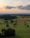 Scenic rural landscape with green fields and lush woods. Hausen ob Verena, Germany.