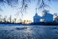 Scenic russian winter wonderland sunset view of non frozen river with trees scenery reflections on water panoramic wide Royalty Free Stock Photo