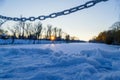 Scenic russian winter wonderland sunset view of non frozen river with trees scenery reflections on water panoramic wide Royalty Free Stock Photo