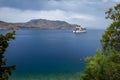 A big cruise ship sailing at Symi island, Greece. Royalty Free Stock Photo