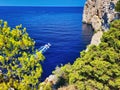 The scenic sea view from the mountain. Pine trees and blue sea. Seascape from sounio cape. Endless sea and not a big island from Royalty Free Stock Photo