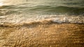 Scenic seascape. Milky foam waves at the beach. Sunset time. Waterscape for background. Selected soft art focus. Sunlight Royalty Free Stock Photo