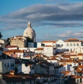 Scenic shot of the Alfama neighborhood featuring the Church of Santa Engracia in Lisbon, Portugal