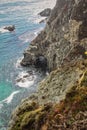 Scenic shot of the beautiful Big Sur Coast of California on a misty day, United States of America aka USA. Foamy waves in the Royalty Free Stock Photo