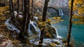 Scenic shot of a beautiful waterfall flowing into a lake in Plitvice Lakes National Park, Croatia Royalty Free Stock Photo