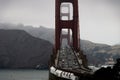 Scenic shot of the Golden Gate Bridge in San Francisco, California on a foggy morning