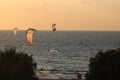 Scenic shot of kitesurfers in the water during sunset at Rhodos, Greece Royalty Free Stock Photo